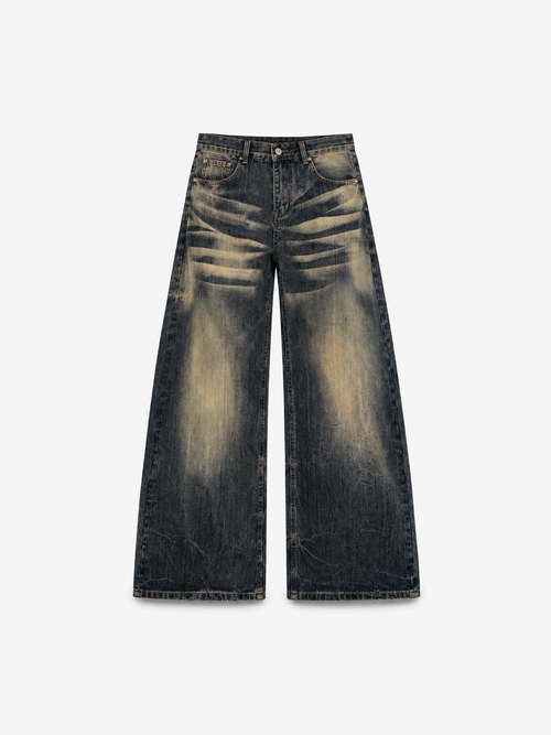 Dusk Wash Barrel Jeans in Shadow Indigo. Front view, showing heavy fading and curved wide legs.