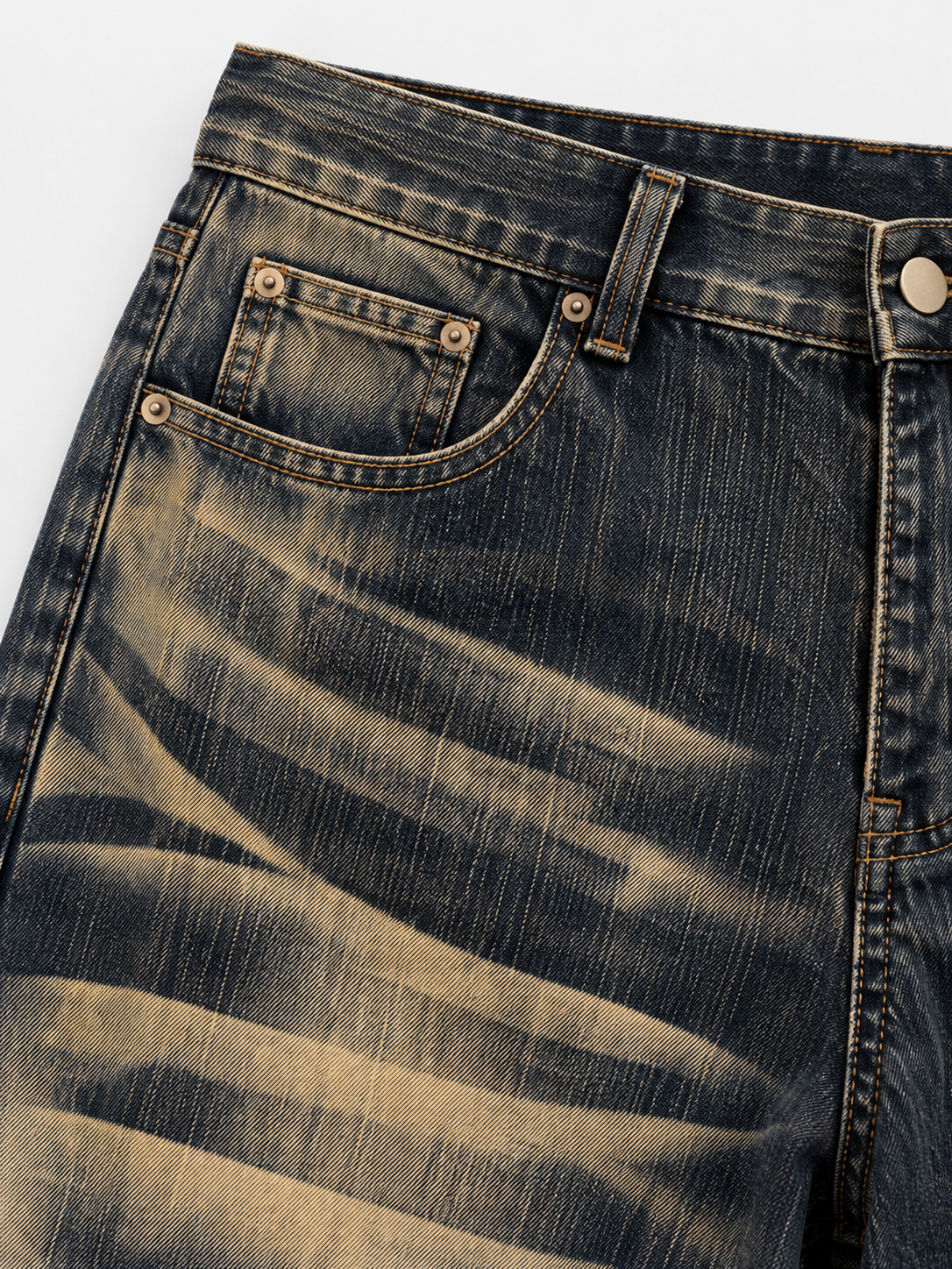 Dusk Wash Barrel Jeans in Shadow Indigo. Close-up of the front pocket and heavily whiskered denim.