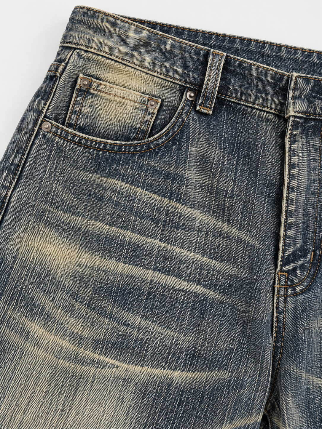 Heritage Wash Baggy Jeans in Olive Ash. Close-up of the front pocket and whiskered denim.