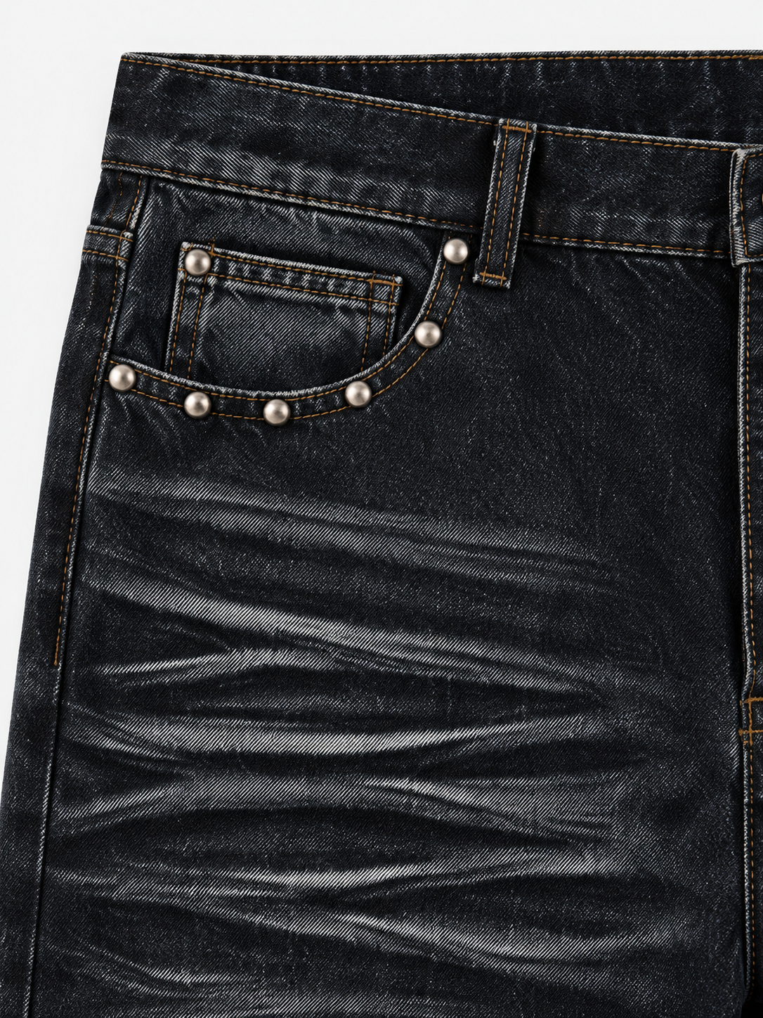 Claw Wash Baggy Jeans in Ash Black. Close-up of the studded front pocket and directional whiskering.