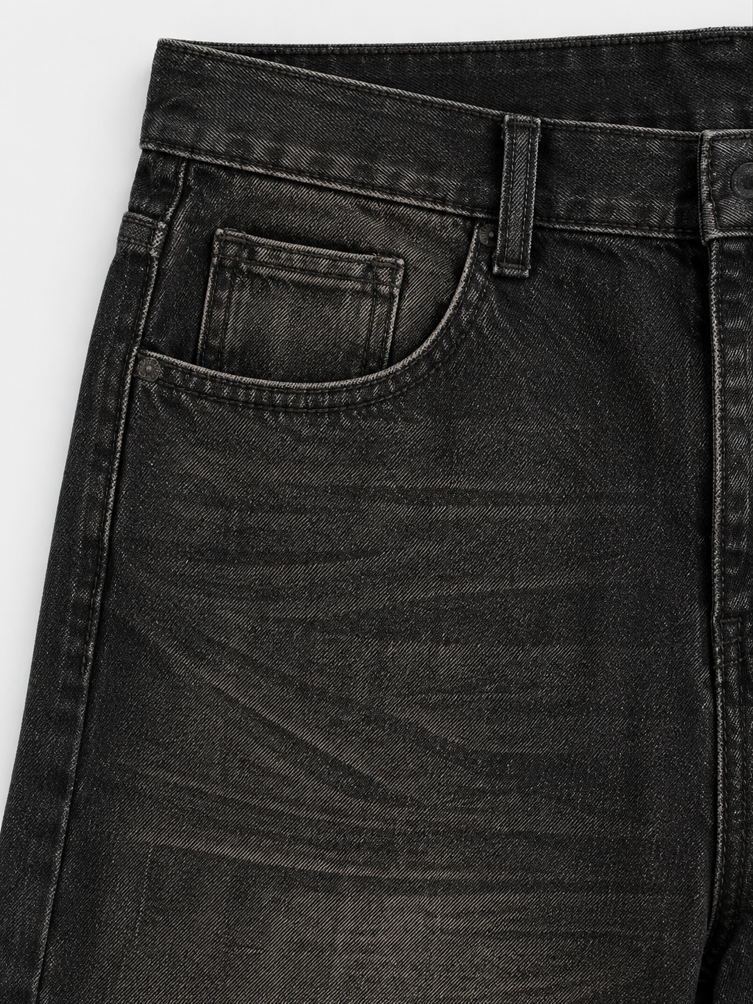 Midnight Wash Baggy Jeans in Charcoal. Close-up of the front pocket and charcoal denim.