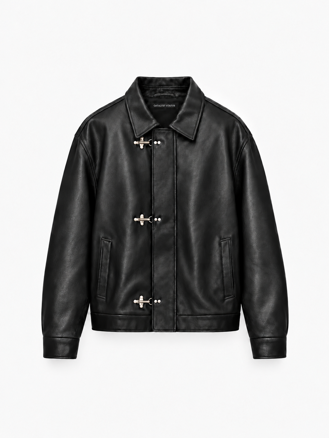 Obscura Leather Toggle Jacket in Jet Black. Front view, showing silver fireman clasps and a pointed collar.